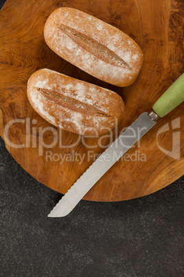 Bread loaves on cutting board