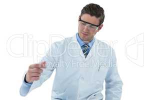 Doctor pretending to be doing experiment