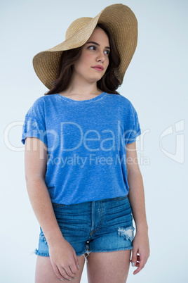 Beautiful woman in blue top and hat