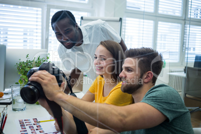 Graphic designers working at desk