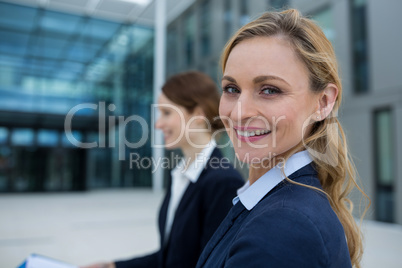 Beautiful businesswoman in office premises