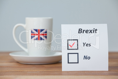 Sticky notes with brexit referendum concept and union jack cup