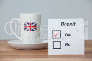 Sticky notes with brexit referendum concept and union jack cup
