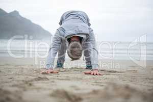 Man push-up on beach