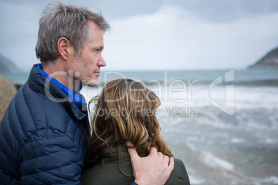 Couple enjoying the view of the beach