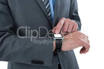 Businessman using his smart watch