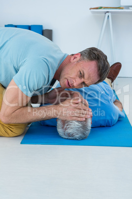 Paramedic performing resuscitation on patient