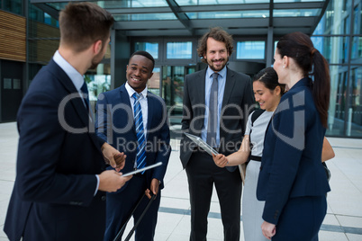 Group of businesspeople having a conversation