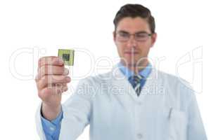 Computer engineer holding computer chip