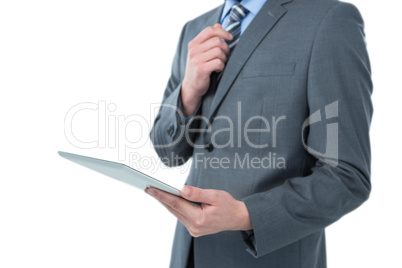 Businessman holding a digital tablet