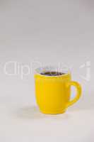 Yellow coffee cup