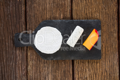 Variety of cheese on slate plate