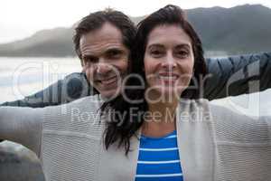 Portrait of romantic couple enjoying on beach