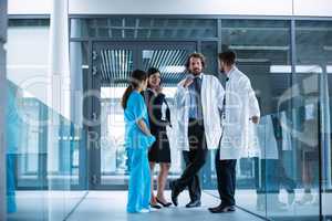 Businesswoman interacting with doctors