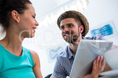 Happy couple using digital tablet Happy couple using digital tablet