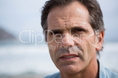 Portrait of man on beach