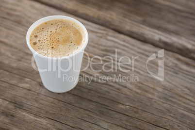 Close-up of coffee in disposable cup