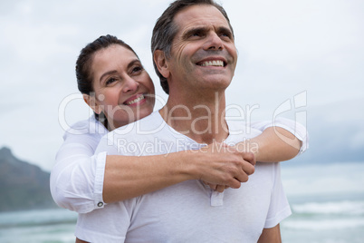 Romantic couple standing on beach