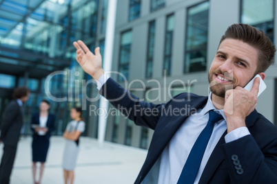 Businessman talking on mobile phone