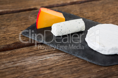 Variety of cheese on slate plate