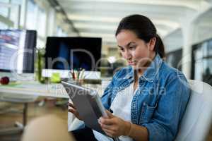 Female business using digital tablet