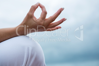 Close-up of woman performing yoga