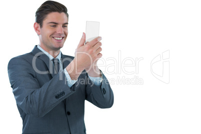 Businessman using futuristic mobile phone