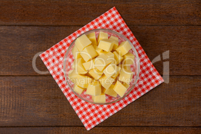 Cheese cubes in bowl on cloth napkin