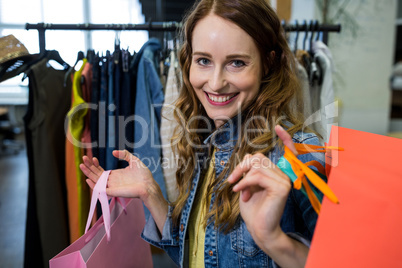 Woman doing shopping at clothes store