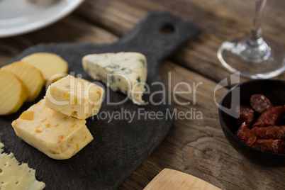 Variety of cheese on slate plate