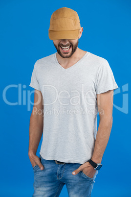 Cheerful man in cap