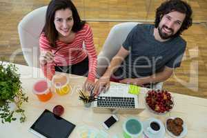 Graphic designers working at desk