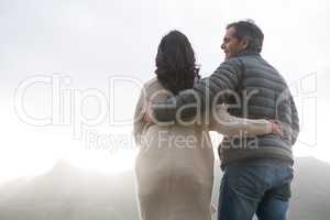 Romantic couple embracing each other on beach