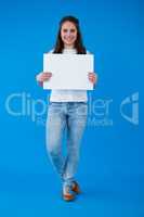 Woman holding a blank placard