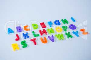 Multicolored alphabets on white background
