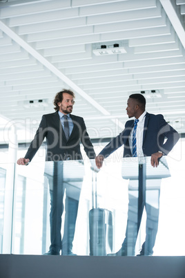 Businessman talking with colleague Businessman talking with colleague