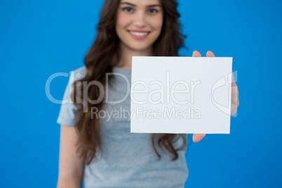 Woman holding a blank placard