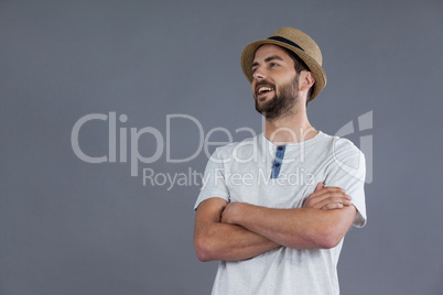 Happy man in white t-shirt and fedora hat
