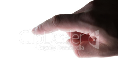 Man hand pretending to be using futuristic digital screen
