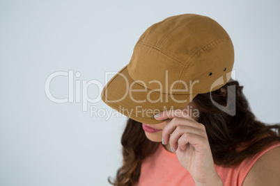 Woman in brown cap