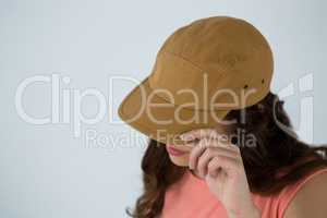 Woman in brown cap