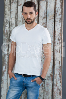 Man in white t-shirt and blue jeans