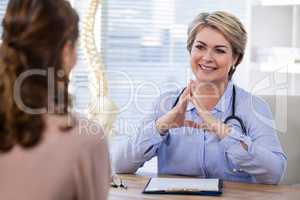 Doctor interacting with patient