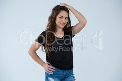 Woman in black t-shirt and hot pants