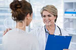 Doctor interacting with patient