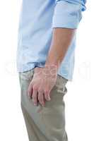 Man with his thumb in pocket