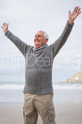 Happy senior man with arms wide open