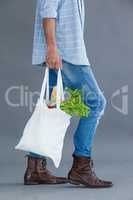 Man carrying grocery bag