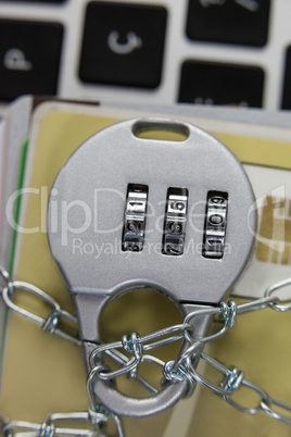 Smart cards locked in chain on laptop