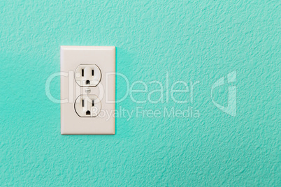 Electrical Sockets In Colorful Bright Teal Wall